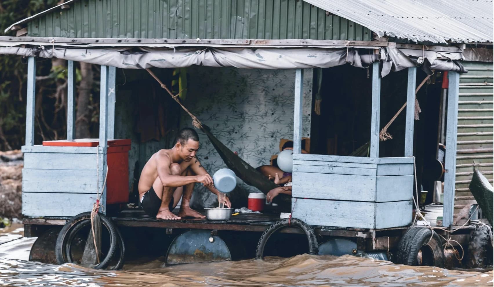 River gauge and flood monitoring station near riverbank